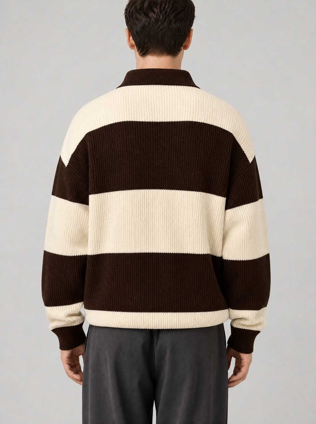 Back view of a brown and cream striped knit polo sweater showing the collar and sleeves