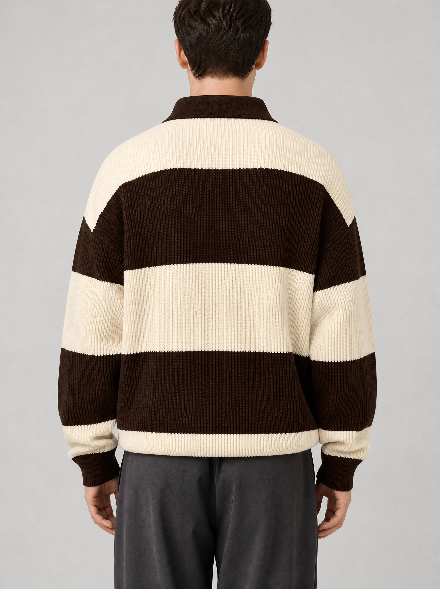 Back view of a brown and cream striped knit polo sweater showing the collar and sleeves