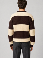 Back view of a brown and cream striped knit sweater showing the shoulder line and sleeves