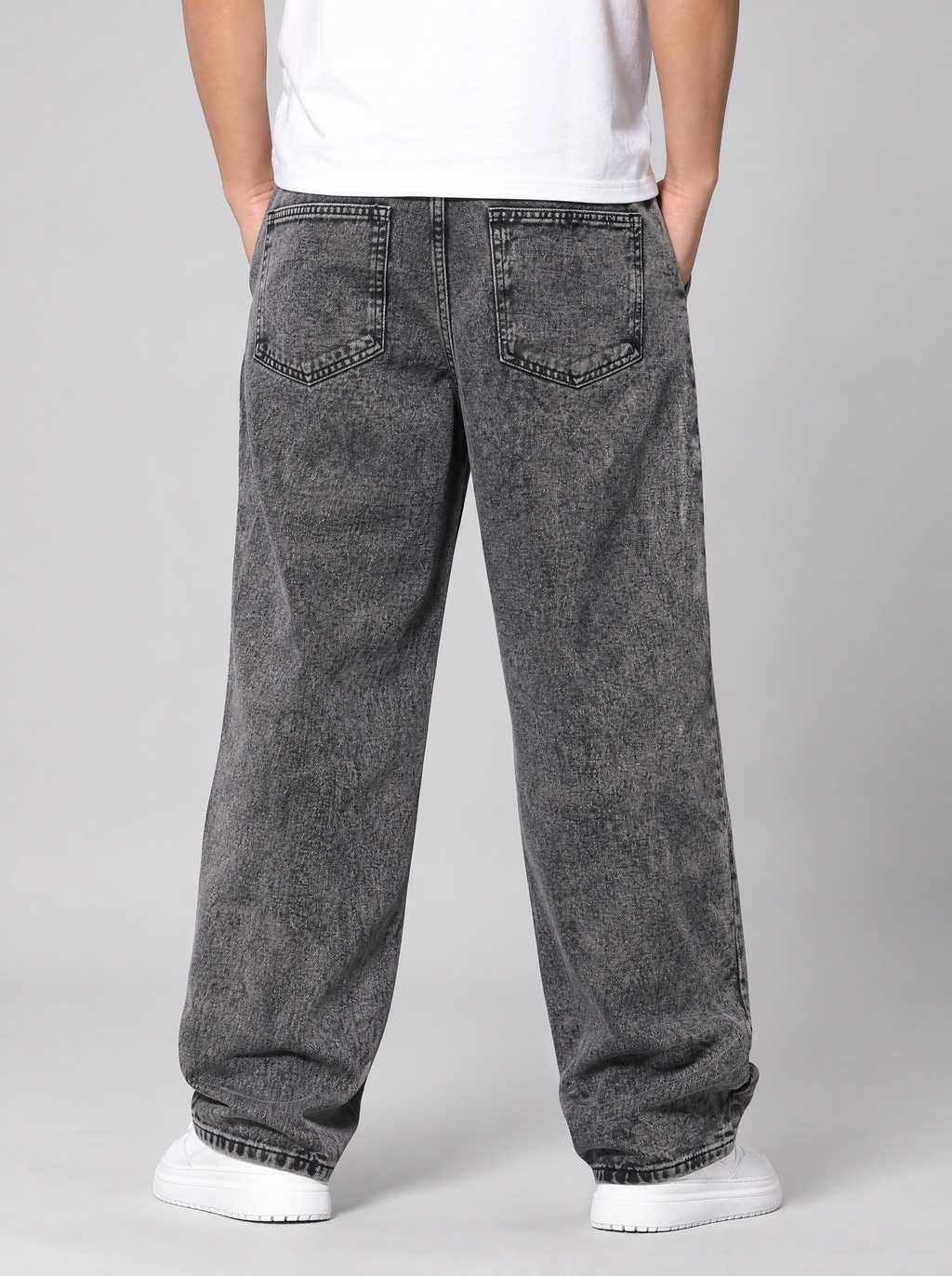 Back view of smoke grey washed relaxed straight jeans showing the back pockets and yoke