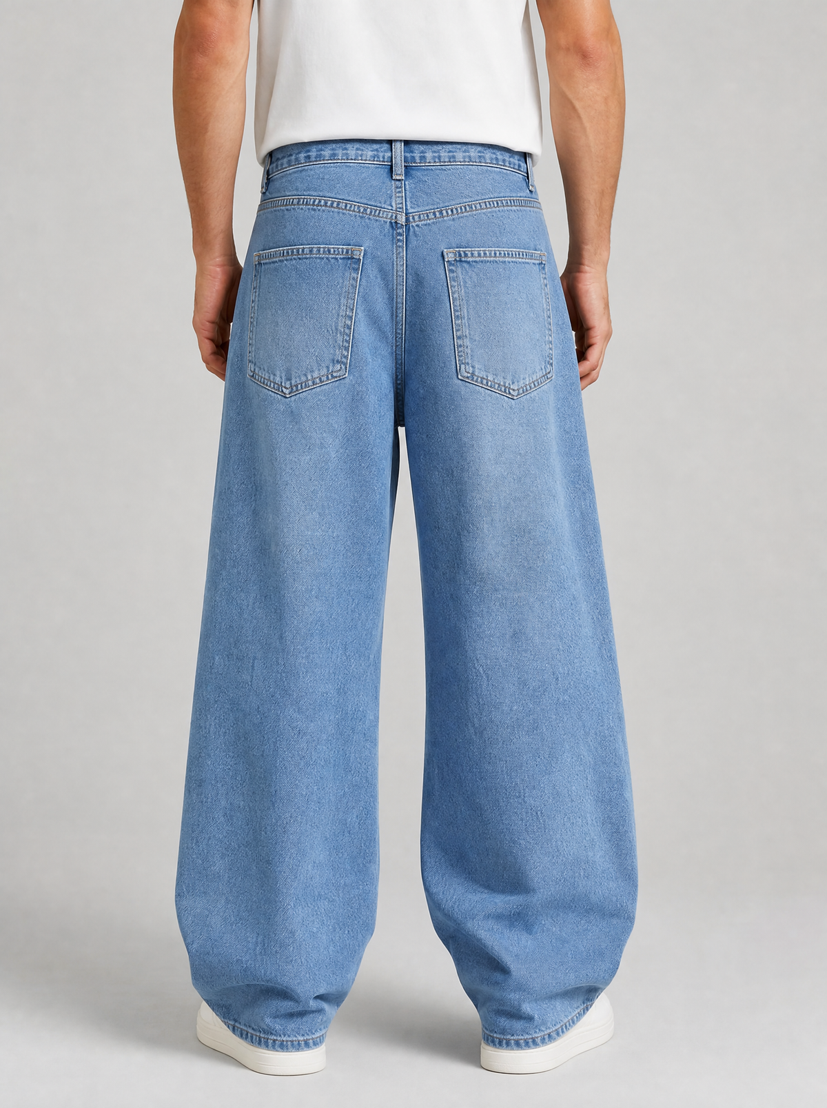 Back view of Y2K baggy wide leg jeans showing the back pockets and yoke